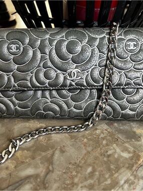 CHANEL Metallic Silver Camellia Quilted long wallet